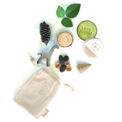Wild Safari Sensory Bag with non-toxic playdough, wooden slice, safari cutter, and natural accessories for educational play.